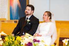 Bride and Groom Listening to Homily