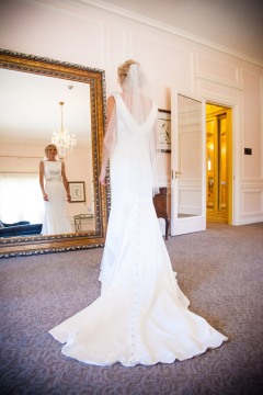 Bride Looking in Mirror