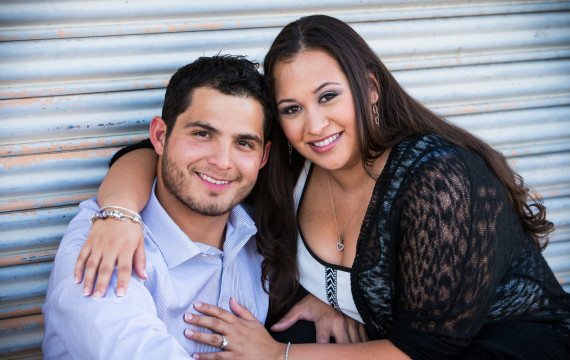 Engagement pose in alley