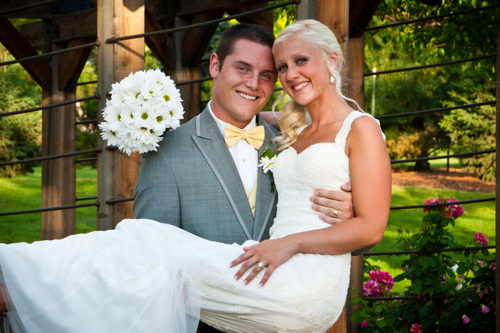 Groom holding bride at Hudson Gardens